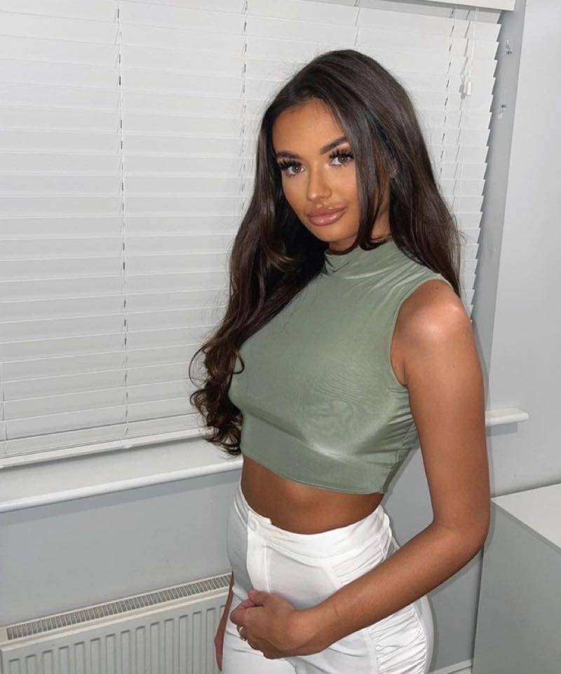 Darcie in green