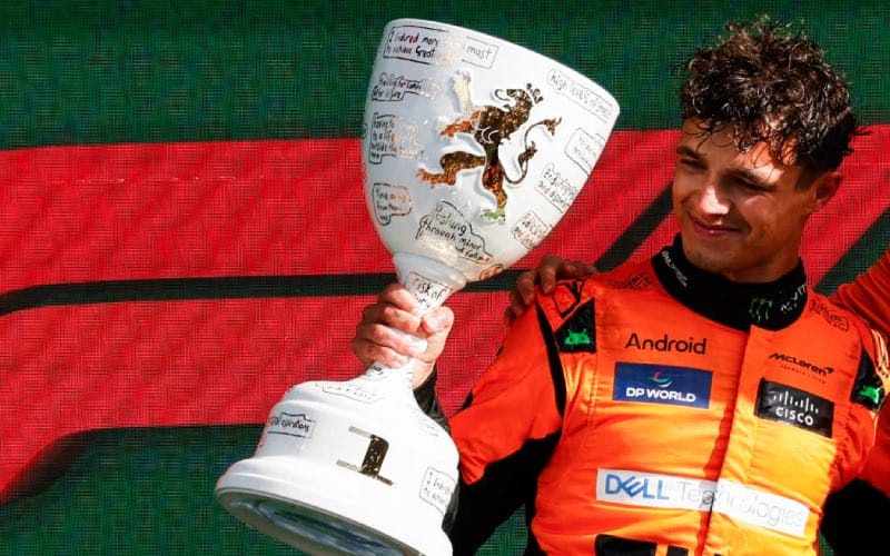 Lando Norris holding Trophy