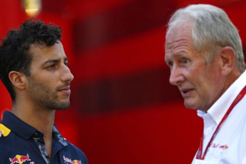 Daniel Ricciardo and Helmut Marko behind Christian Horner