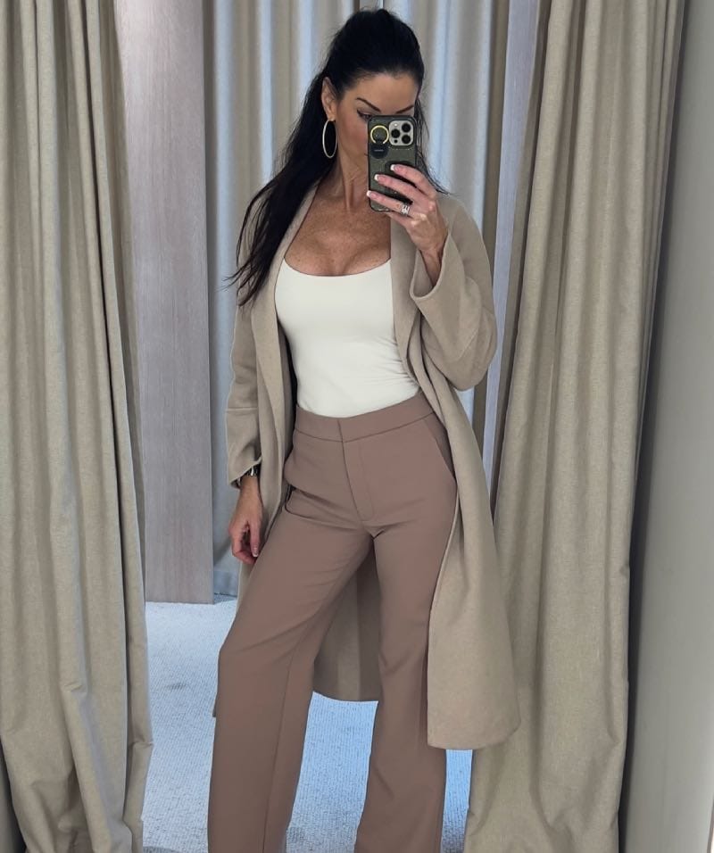Kim in fitting room