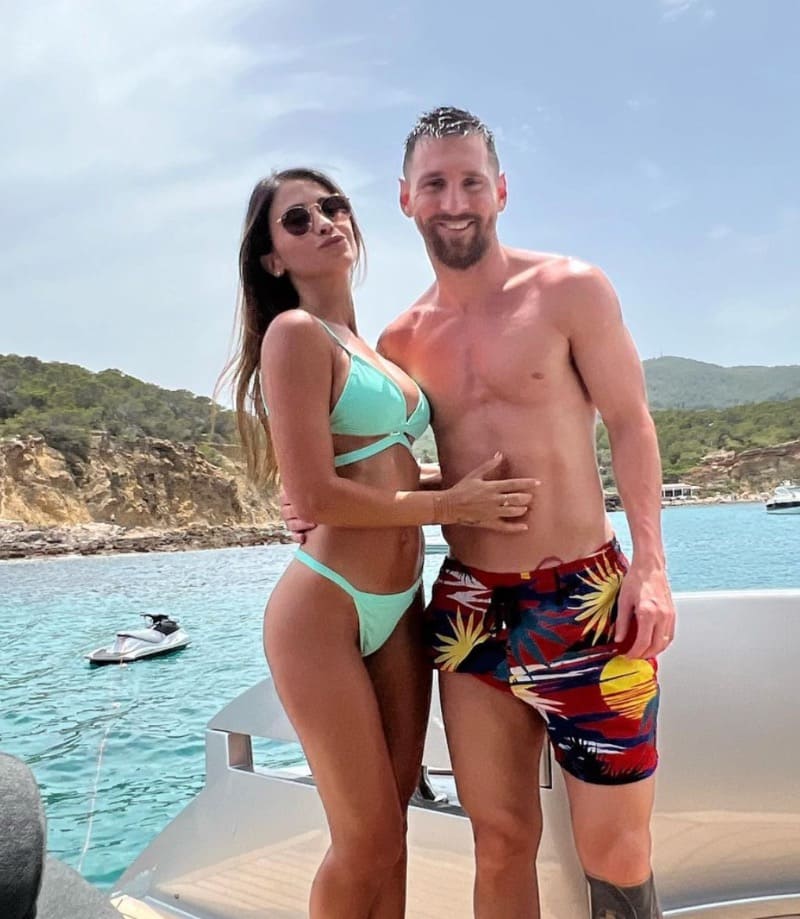 Antonella with Messi in green