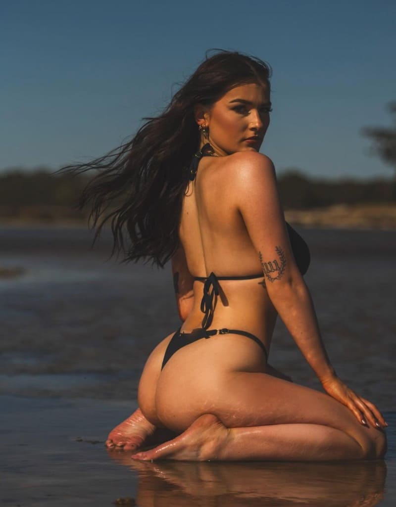Jade in bikini on beach