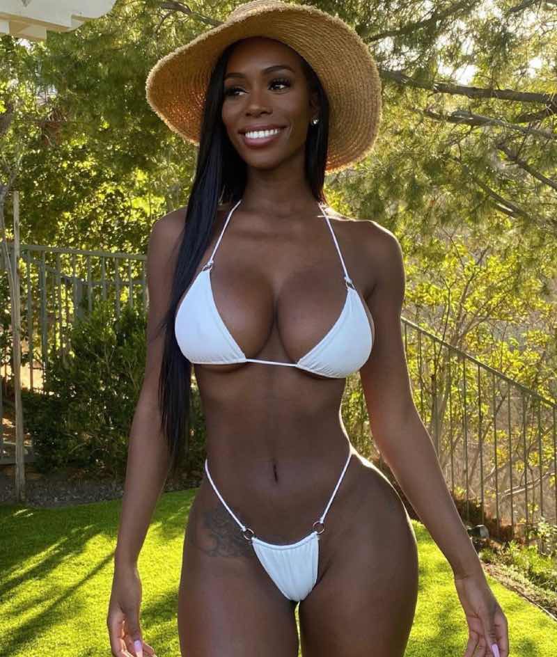 Babe in white bikini with hat