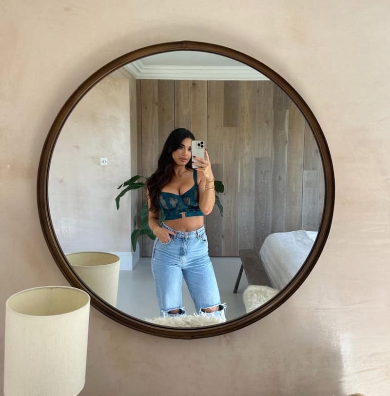 Babe in lingerie top and jeans