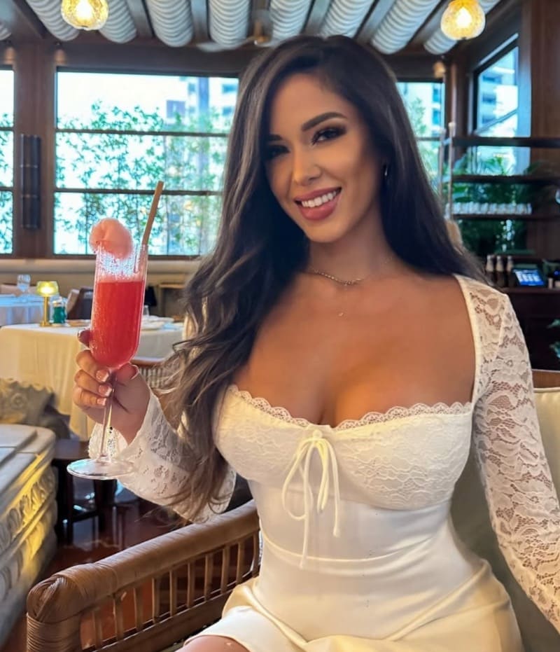 Babe with massive tits in white outfit in cafe