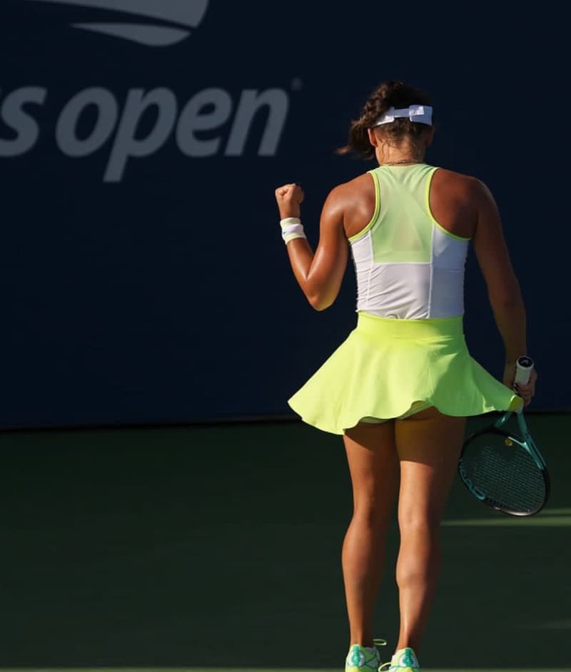 Arina on court in sexy short dress