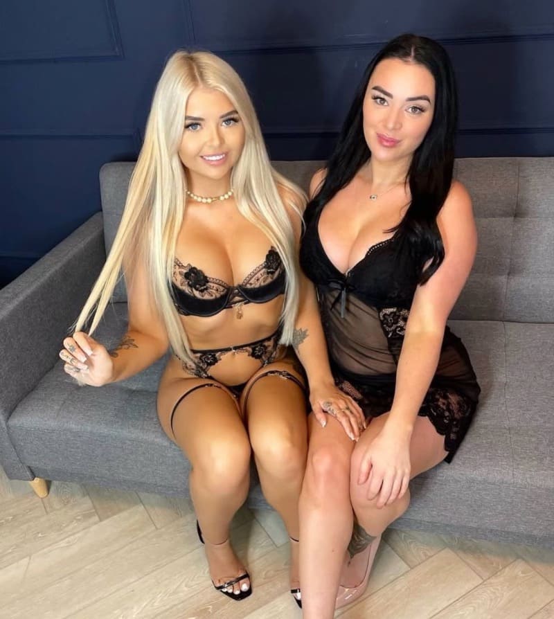 Babes on couch in seductive pose