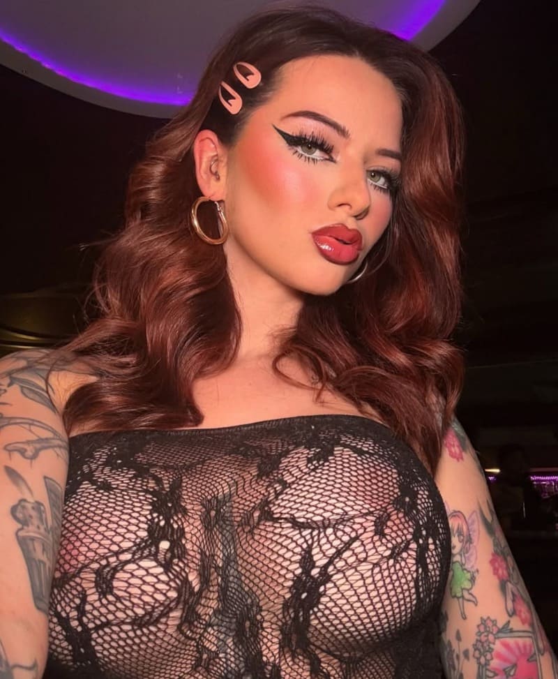 Babe with massive tits and see through lingerie