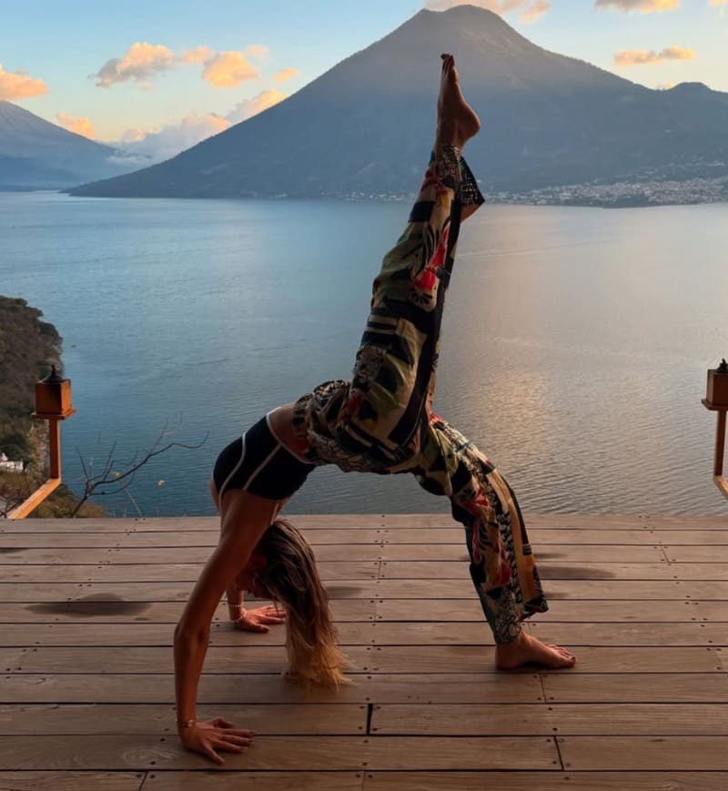 Yulia performing yoga with a view