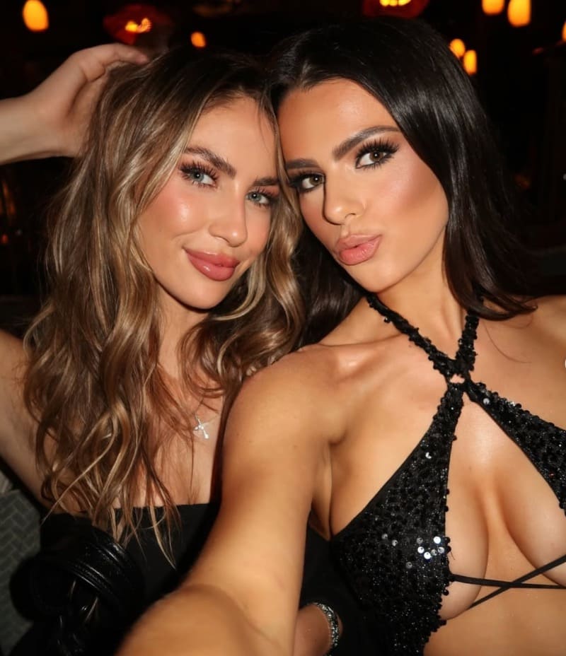 Yulia and friend in tight dresses