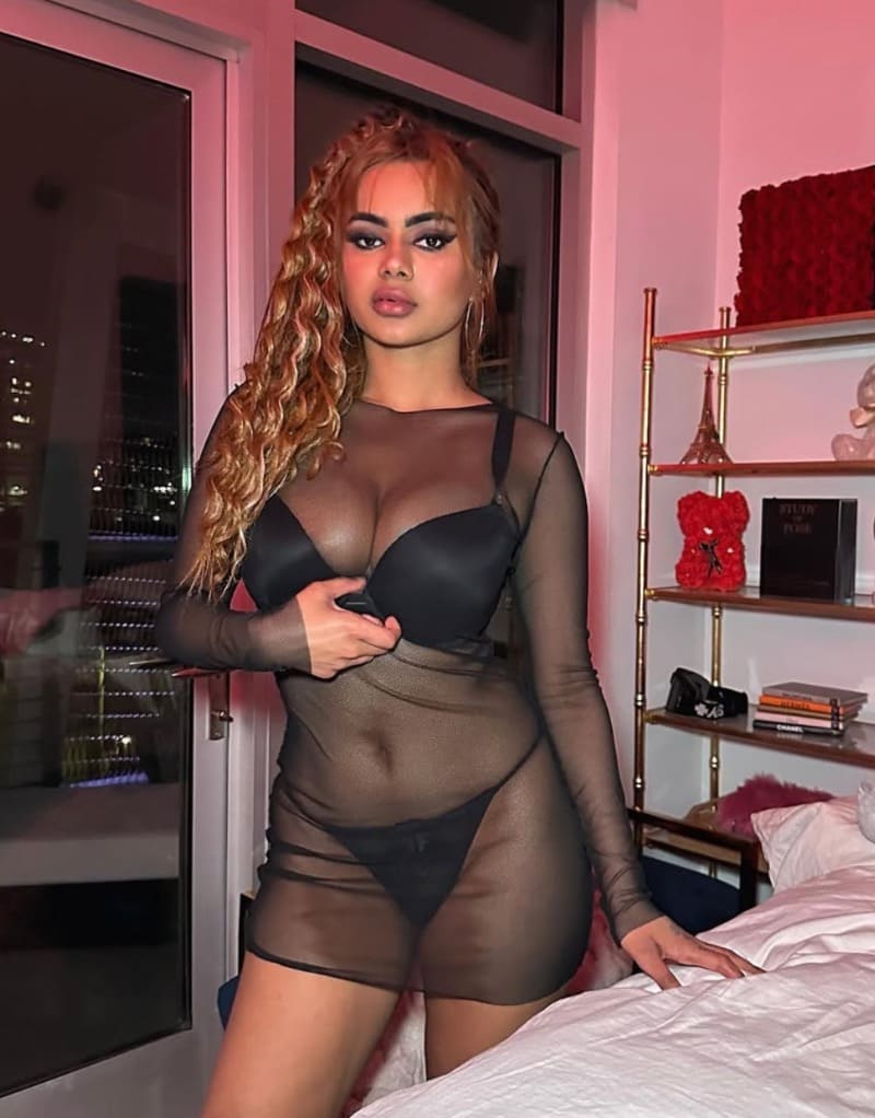 Babe with massive tits in see through outfit