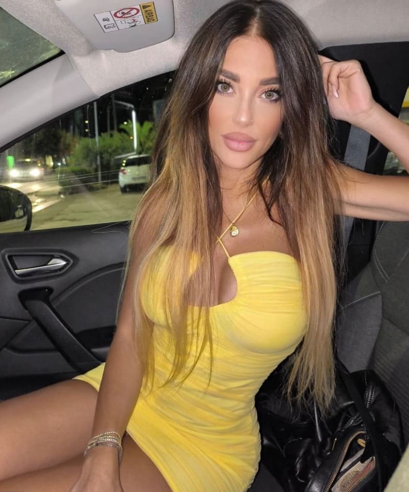 Lucia in yellow short dress in car with nice big tits