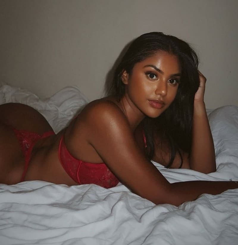 Babe on bed in red lingerie