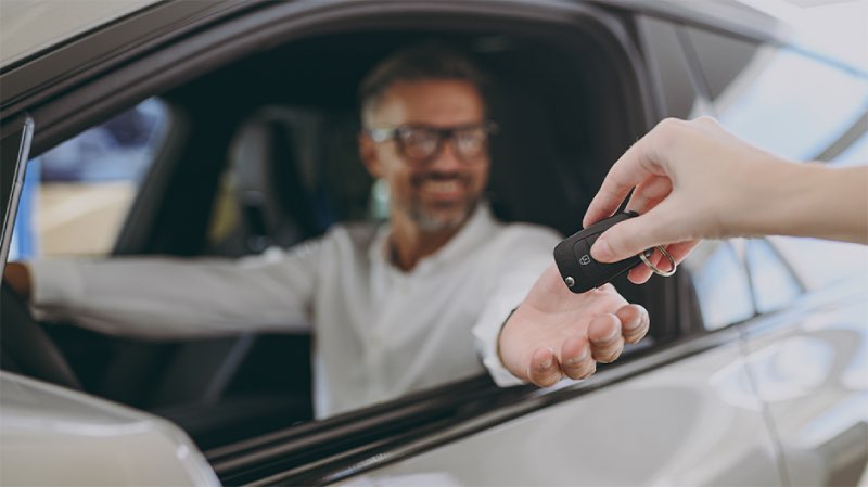 Man buying electric cars