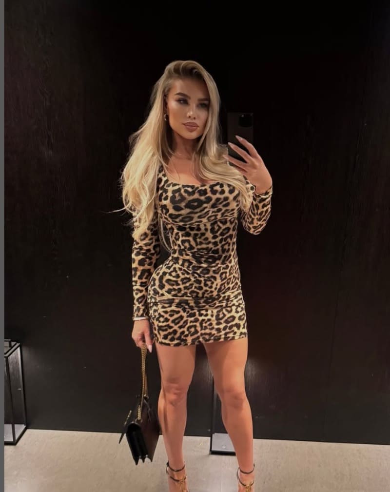 Natalia in sexy outfit