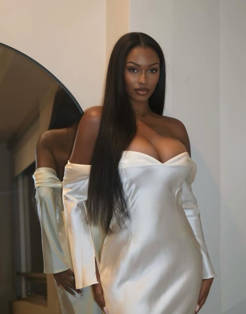 Babe in white satin dress