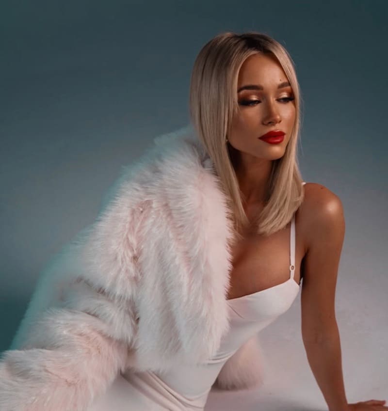 Eszter in white dress with white jacket