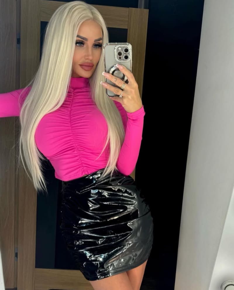 Babe in sexy latex dress and tight pink top