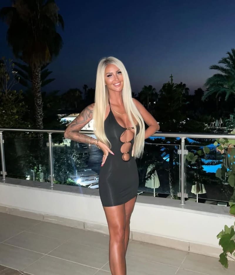 Ewelina in tight dress with nice cleavage