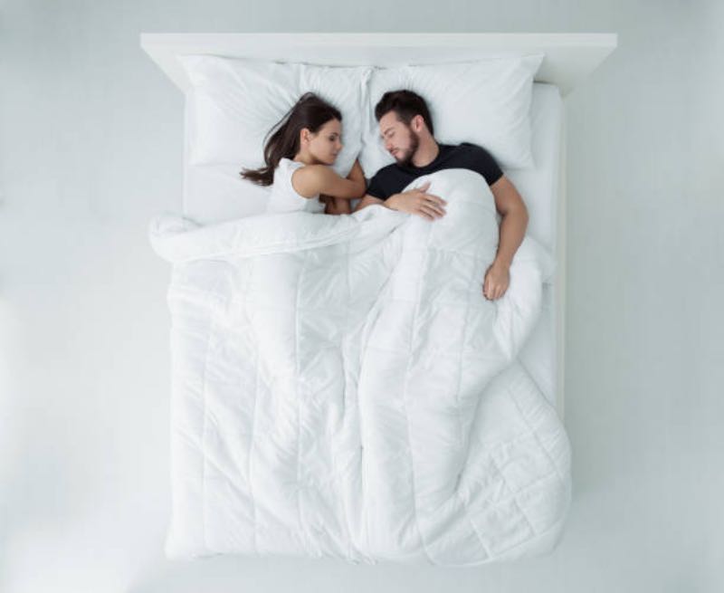People in bed recording amateur porn