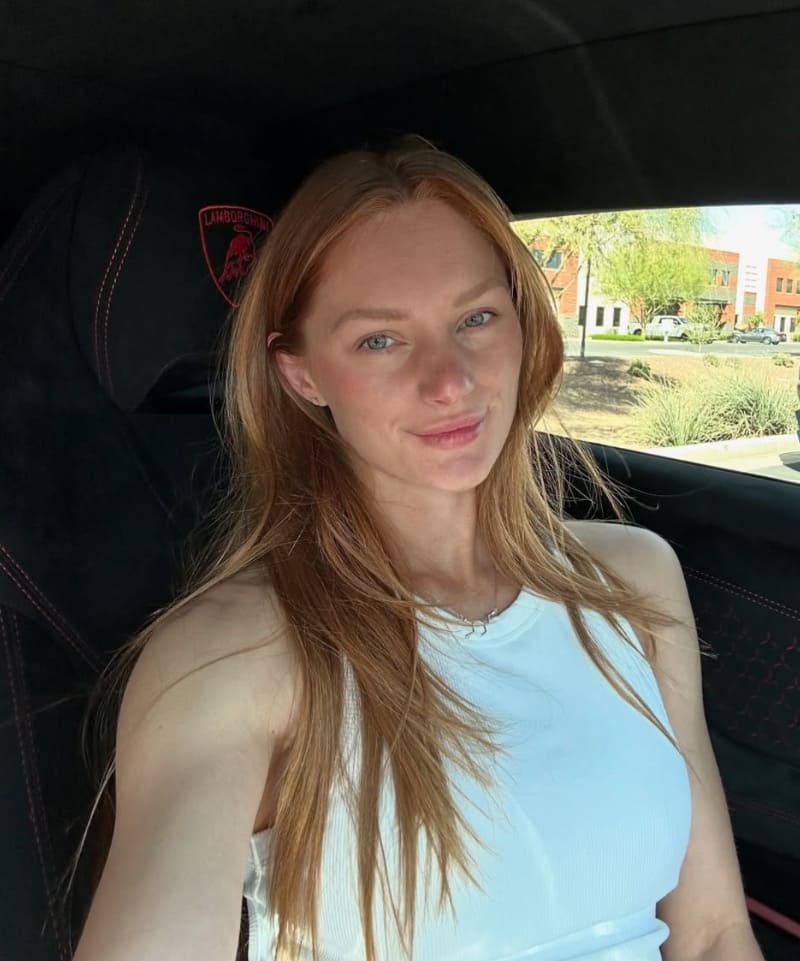Babe in Lamborghini in tight white top
