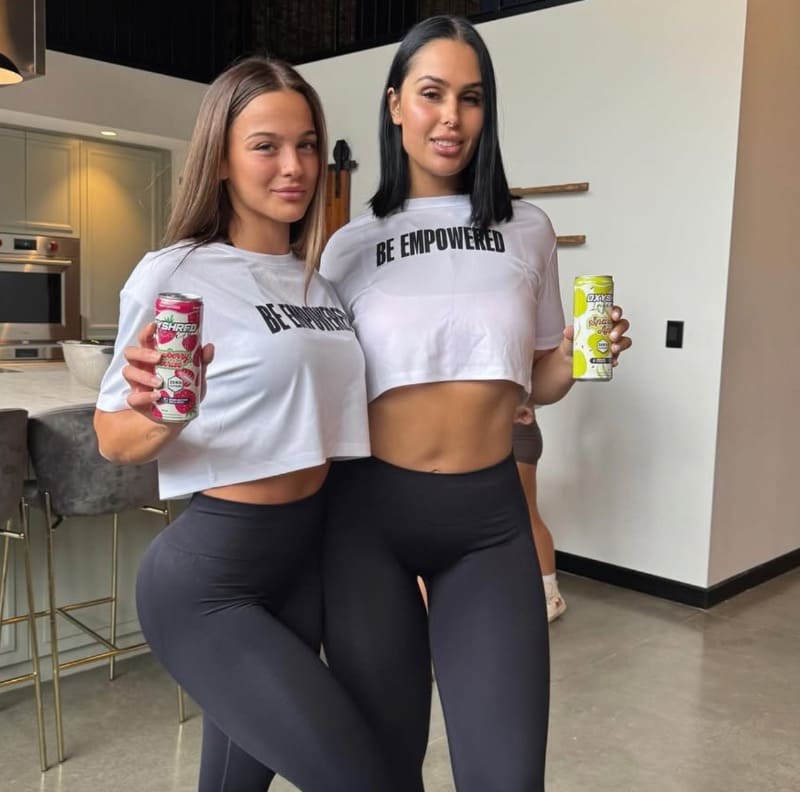 Aalia and friend in tight white tops