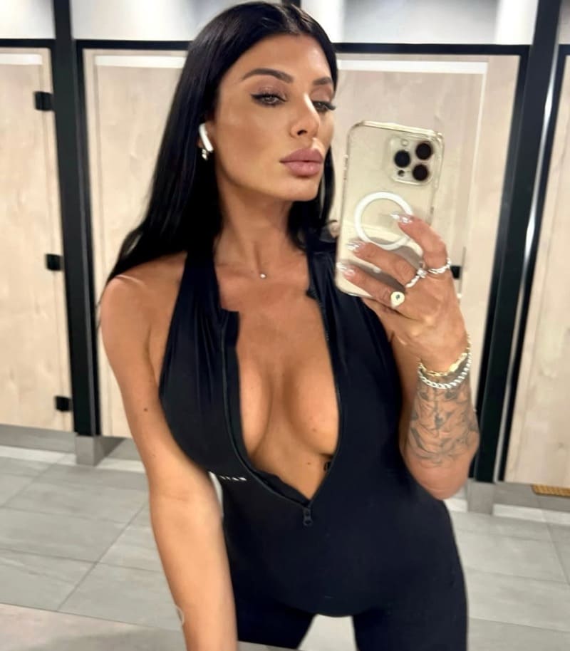 Babe with big tits in black outfit 