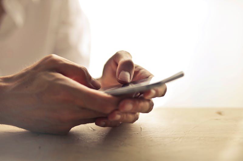 Person touching phone