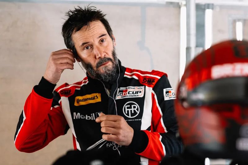 Keanu Reeves in race outfit