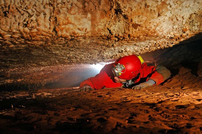 Man in grot Caving 