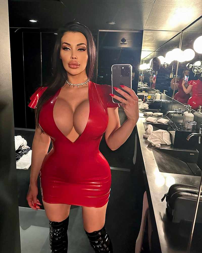Aletta Ocean im engen roten Pornokleid