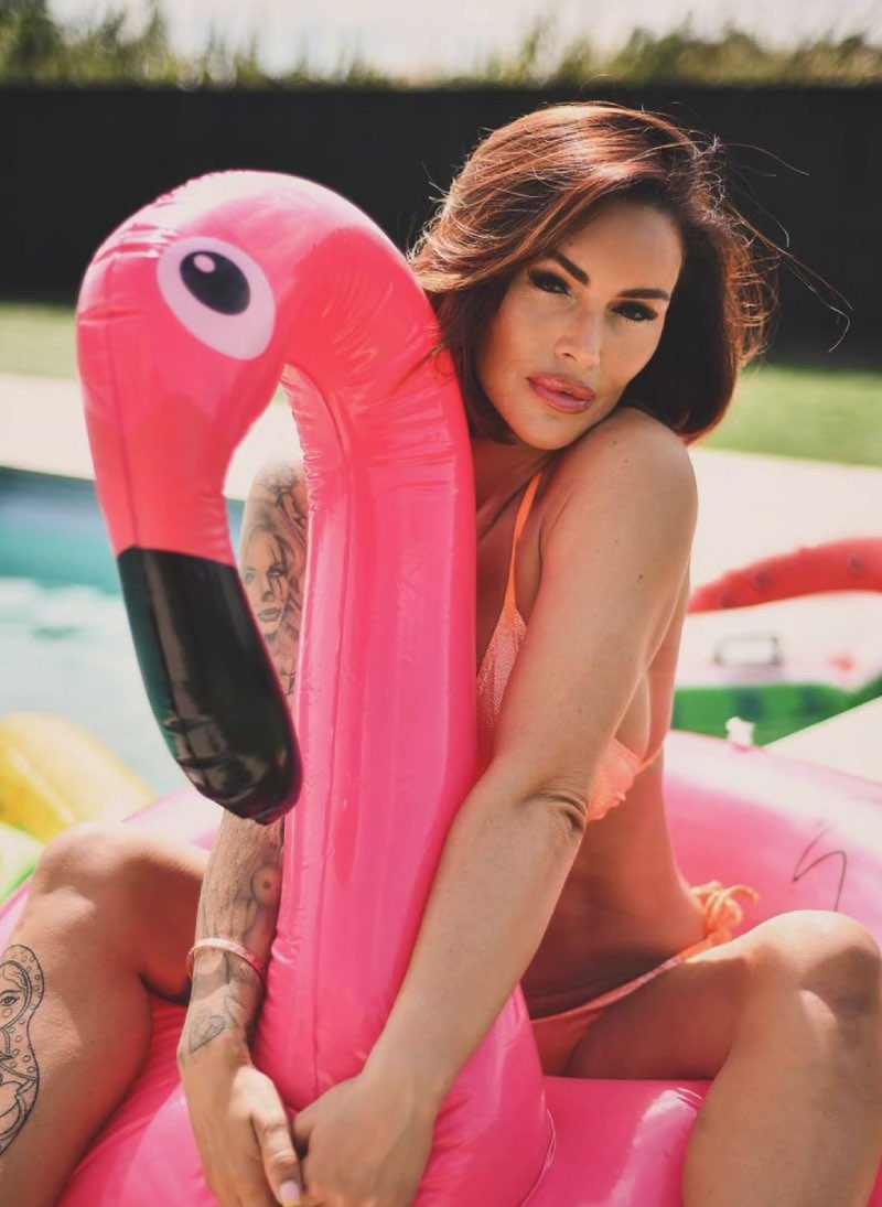 Sexy babe on pool floaty