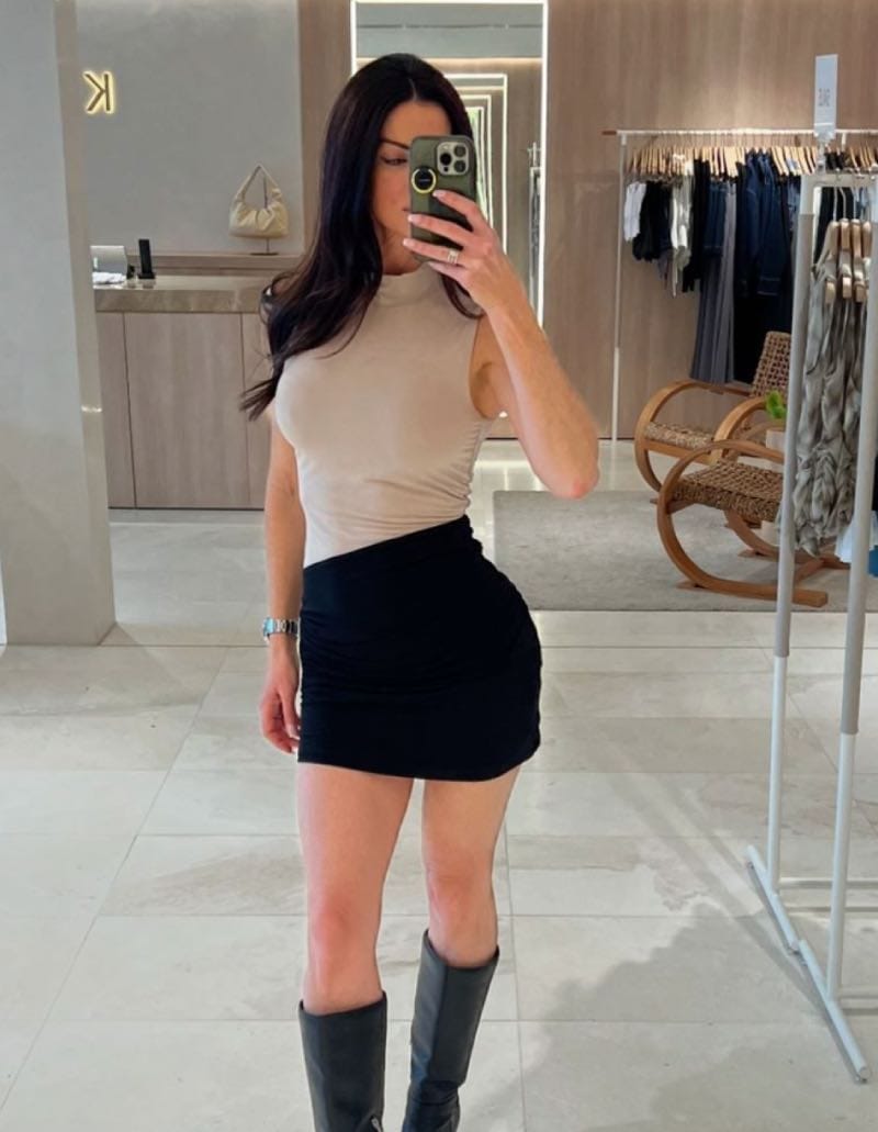 Kim in skirt