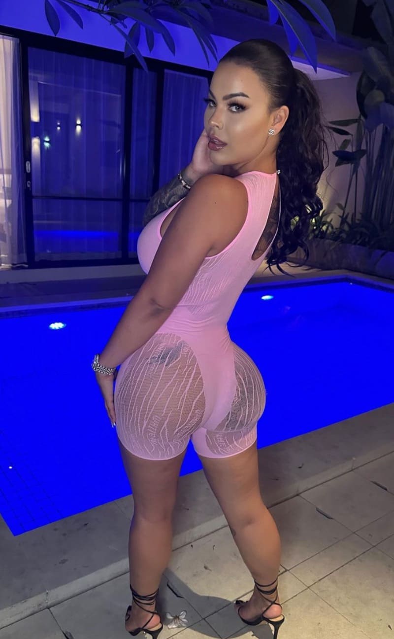 Casey next to pool