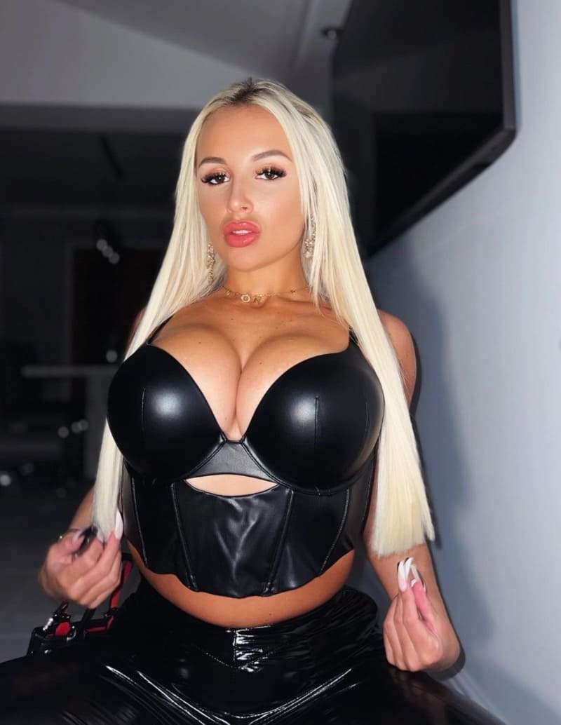 Bethany in top with big cleavage