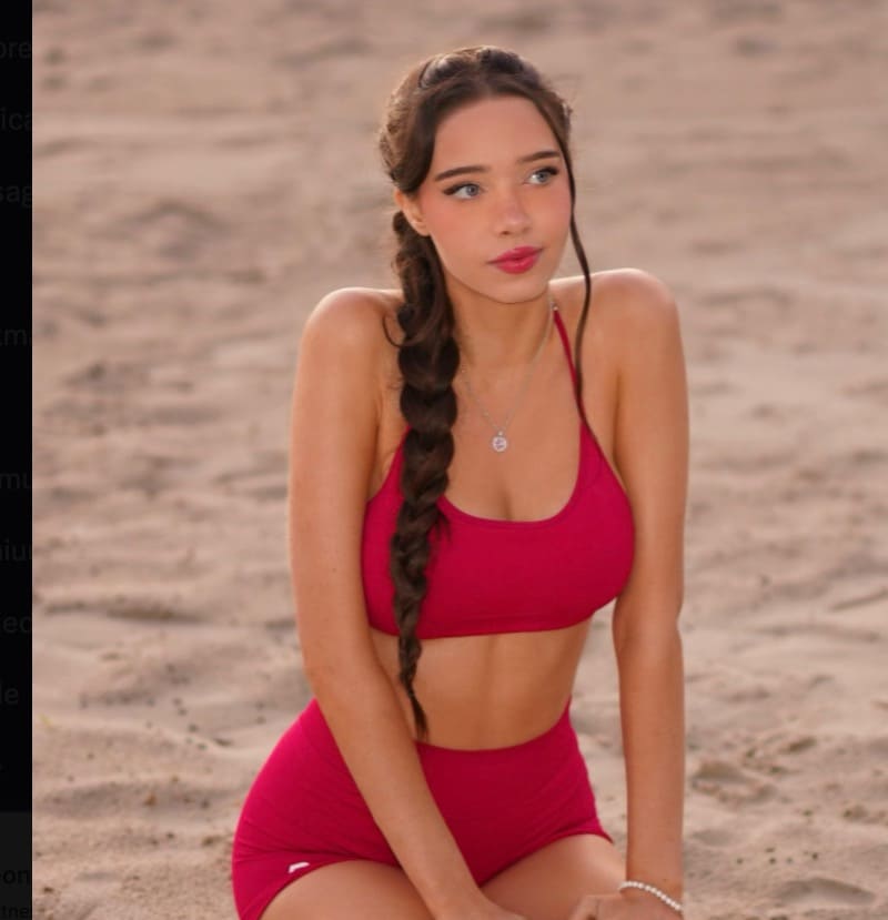 Lydia in red sports outfit