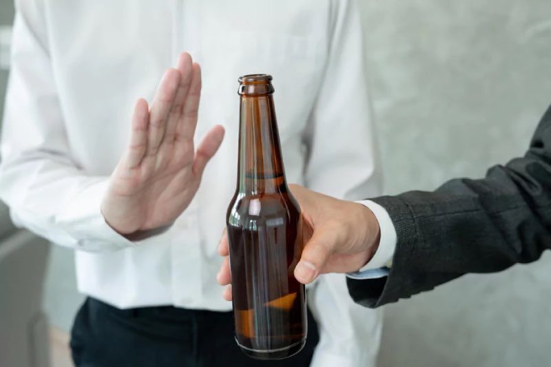 Person Saying No to Alcohol