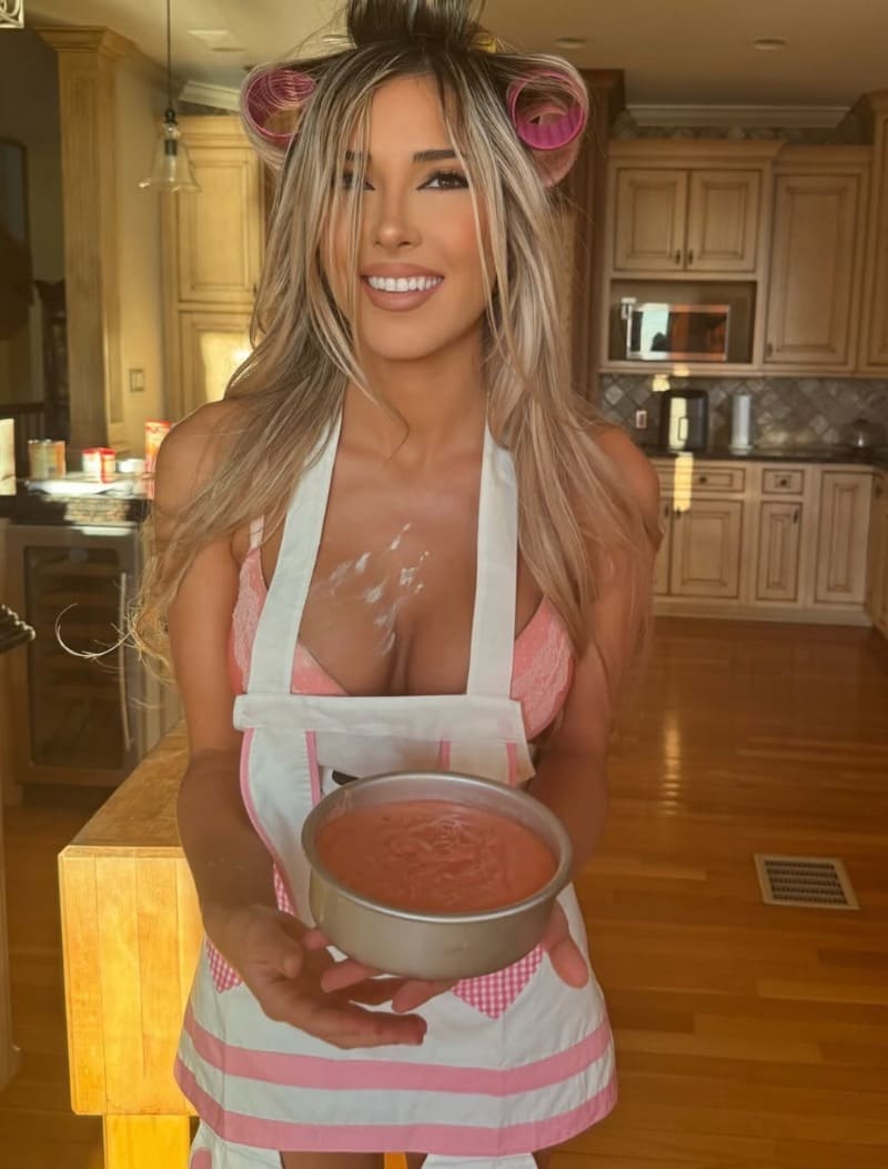 Linda making food in lingerie