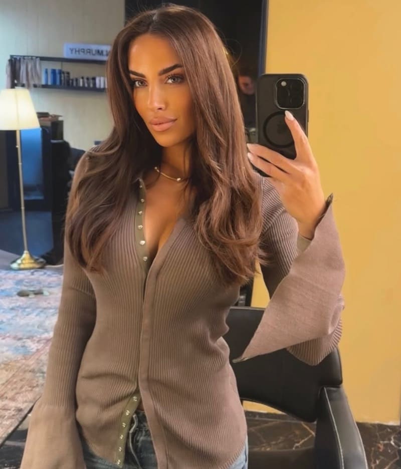 Hot brunette in beige top