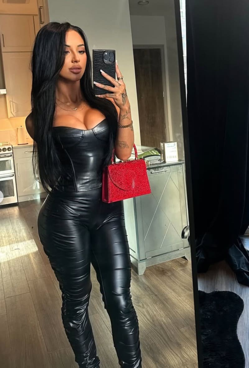 Brooke in tight black outfit