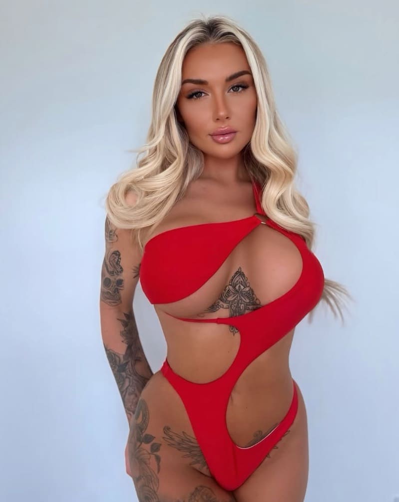 Charlotte in sexy red outfit