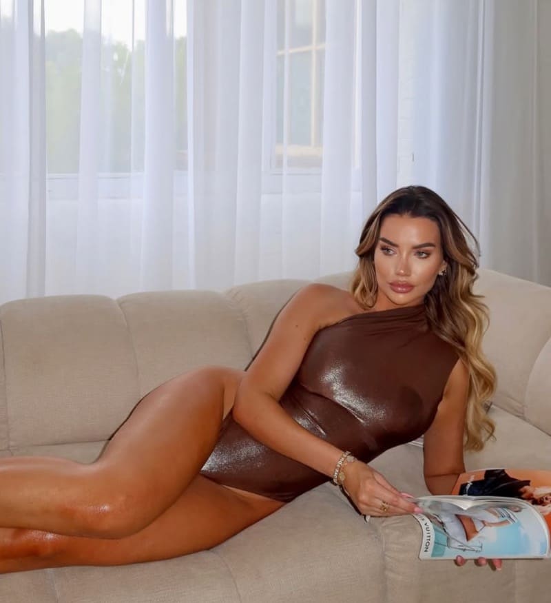 Babe in brown leather lingerie