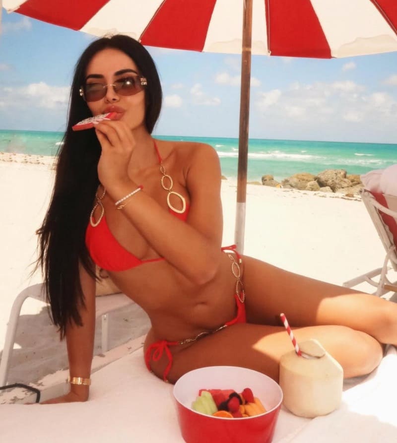 Sephora in sexy bikini on beach towel