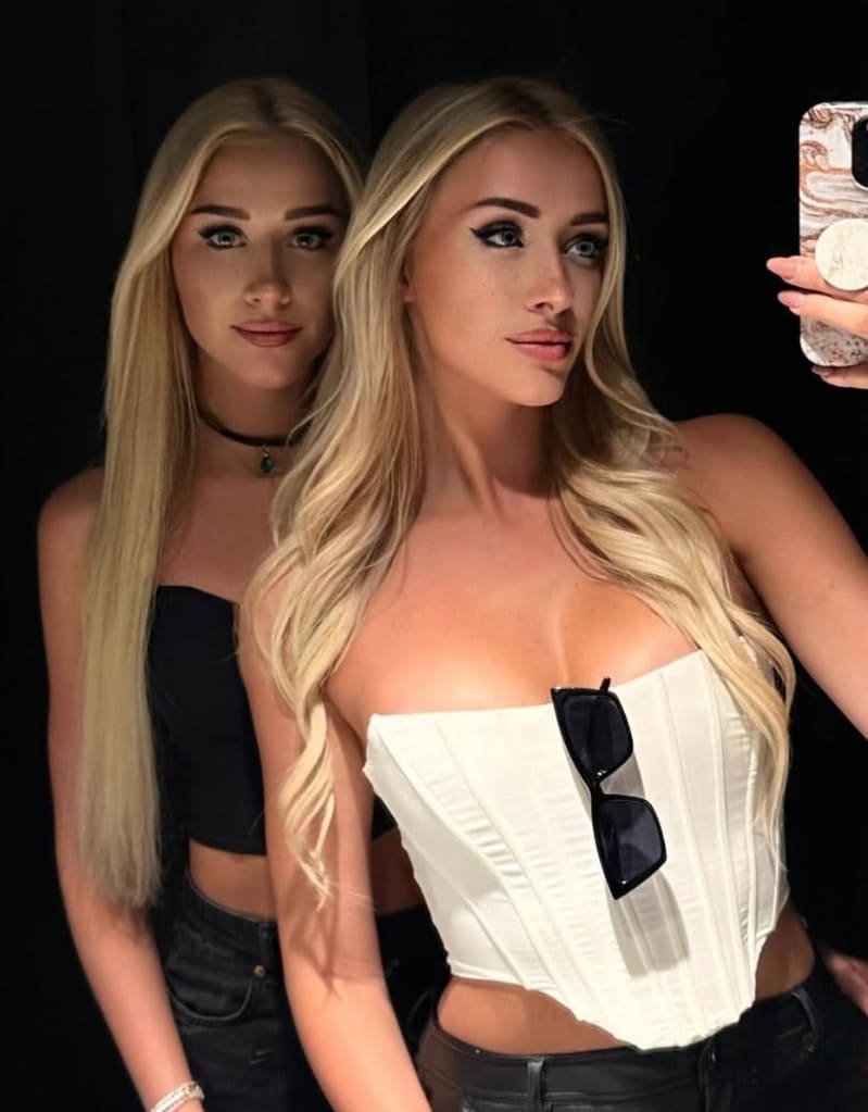 Nicole and her sister in sexy tops