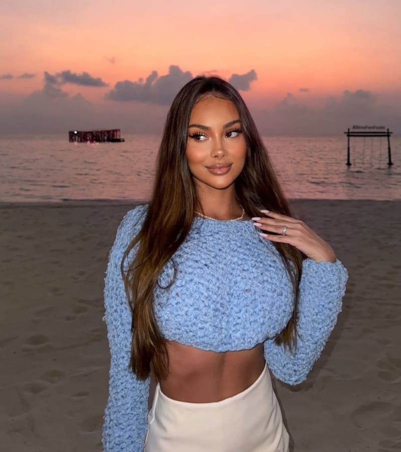 Babe in blue top with massive tits