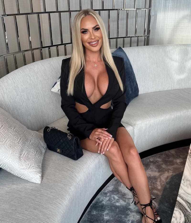 Maddison on couch in black