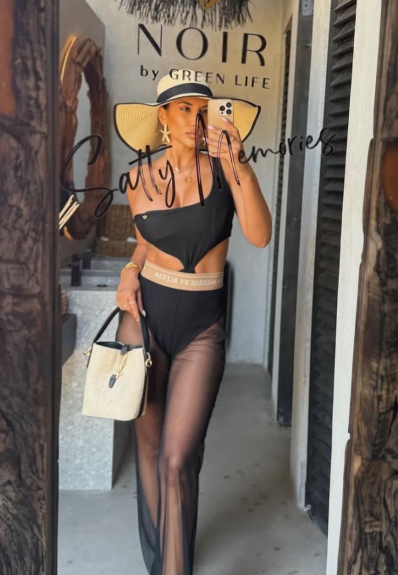 Deana in black outfit
