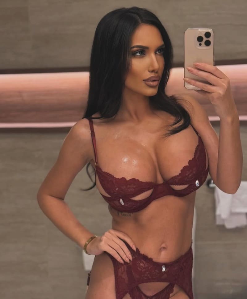 Deana showing off tits in lingerie