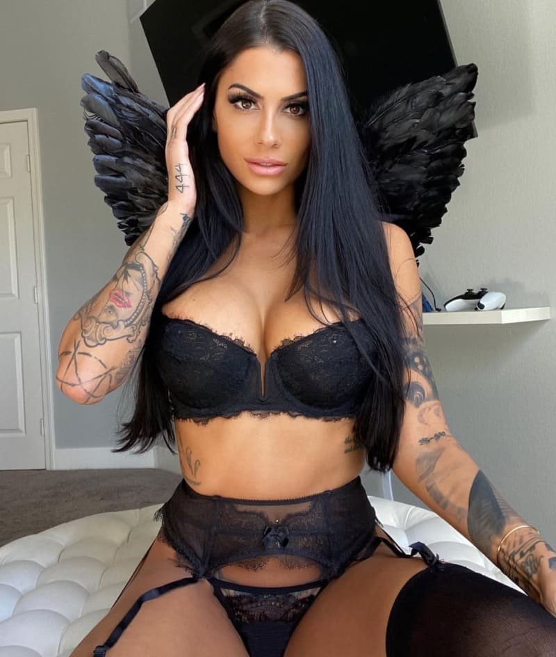 Babe in angel lingerie with nice tits