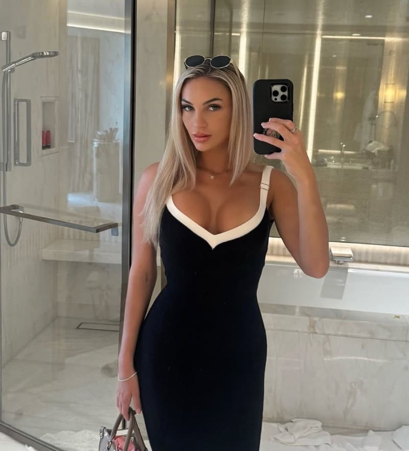 Oceania in black dress